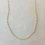 Becoming Jewelry's Gold Filled Figaro Chain necklace on a neutral background.