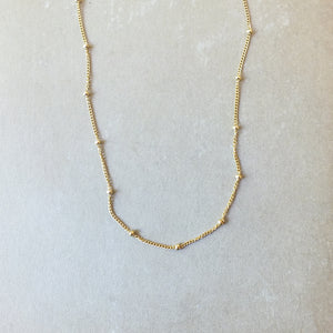 Becoming Jewelry Gold Filled Satellite Chain Necklace on a plain background.