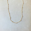 Becoming Jewelry Gold Filled Satellite Chain Necklace on a plain background.