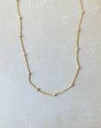 Becoming Jewelry Gold Filled Satellite Chain Necklace on a plain background.