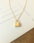 Hidden Treasures Necklace by Becoming Jewelry, displayed on a card with printed lines.