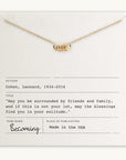 Blessings Necklace displayed on a card with a Leonard Cohen quote and the brand name Becoming Jewelry, indicating the item is made in the USA.