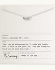 A Blessings Necklace with three rings on a card featuring a Leonard Cohen quote by Becoming Jewelry.