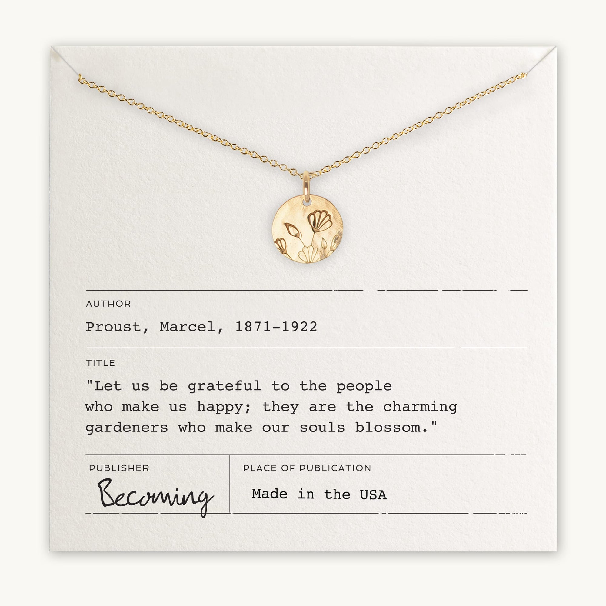 Becoming Jewelry&#39;s Blossom Necklace with a pendant displayed on a card featuring a quote by Marcel Proust about gratitude and happiness.
