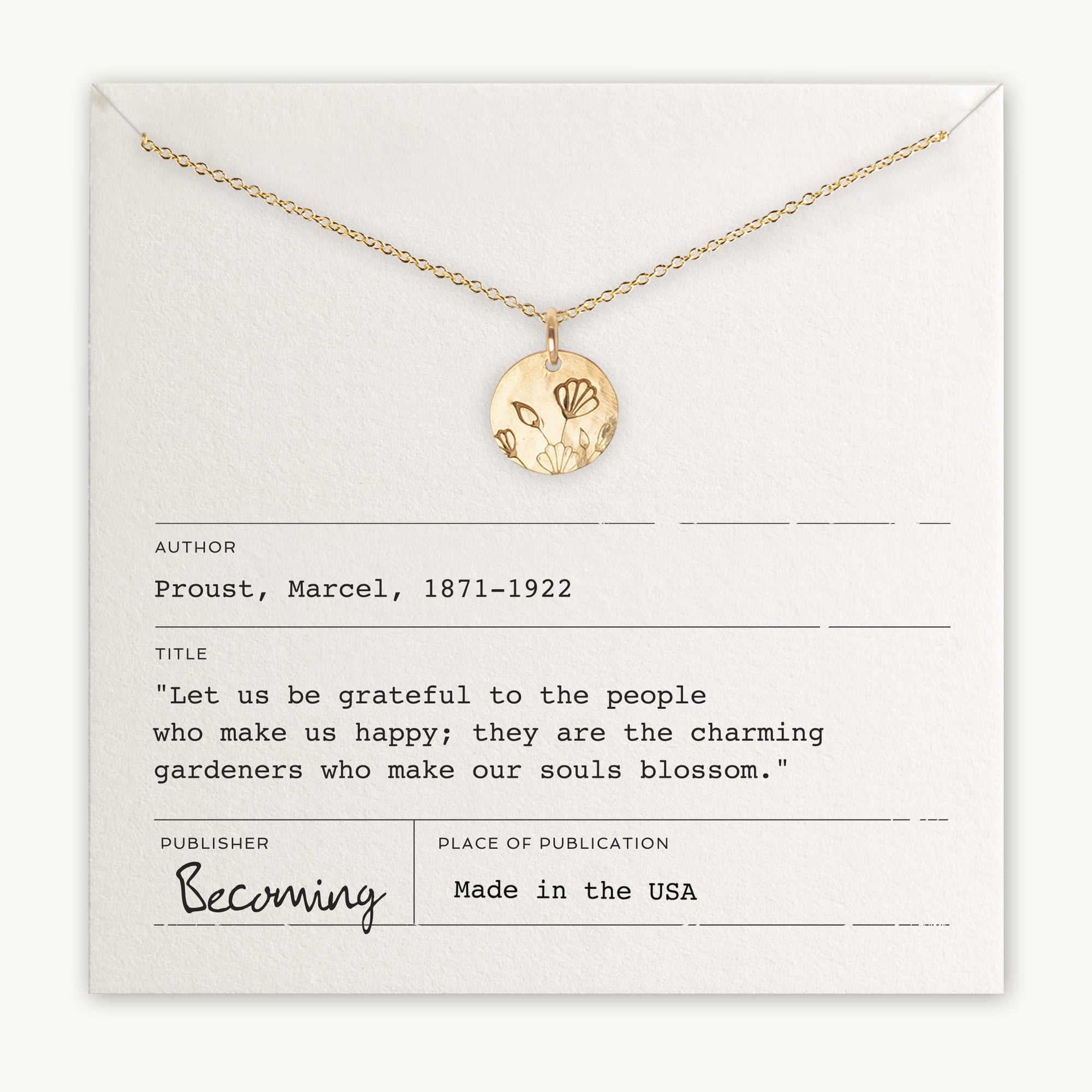 The Blossom Necklace by Becoming Jewelry features a gold pendant engraved with delicate butterflies, elegantly presented on a card bearing Marcel Proust's uplifting quote, "Let us be grateful to the people who make us happy; they are the charming gardeners who make our souls blossom." This piece makes an ideal symbol of friendship and growth.