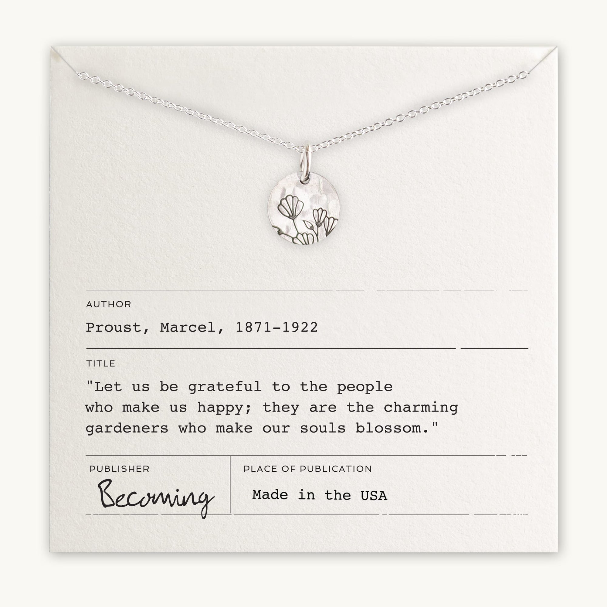 The Blossom Necklace by Becoming Jewelry features a pendant with a blossoming flowers design, beautifully displayed on a card bearing an inspiring quote from Marcel Proust about being grateful to those who make us happy. Proudly made in the USA.