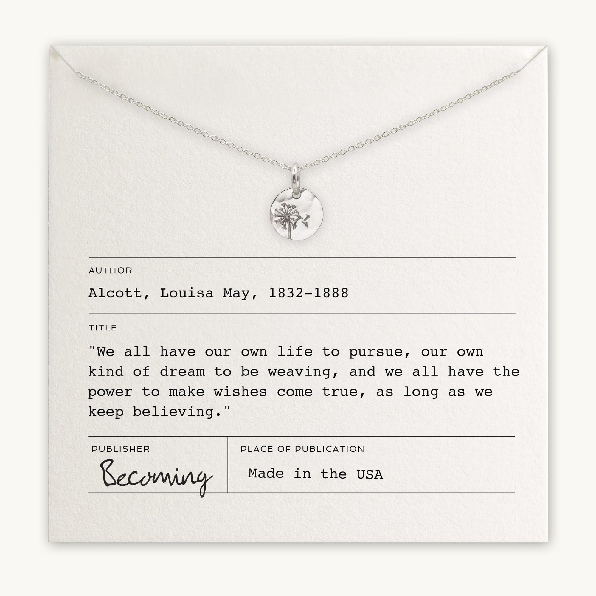 The Dandelion Wishes Necklace by Becoming Jewelry is a delicate piece featuring a round pendant engraved with a flower, presented on a necklace card adorned with an inspirational quote by Louisa May Alcott and details about the USA-made publisher, Becoming. This charming necklace includes uplifting words to elevate your spirit.