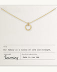 Family Circle Necklace by Becoming Jewelry displayed on a card with an inspirational message about family, made in the USA.