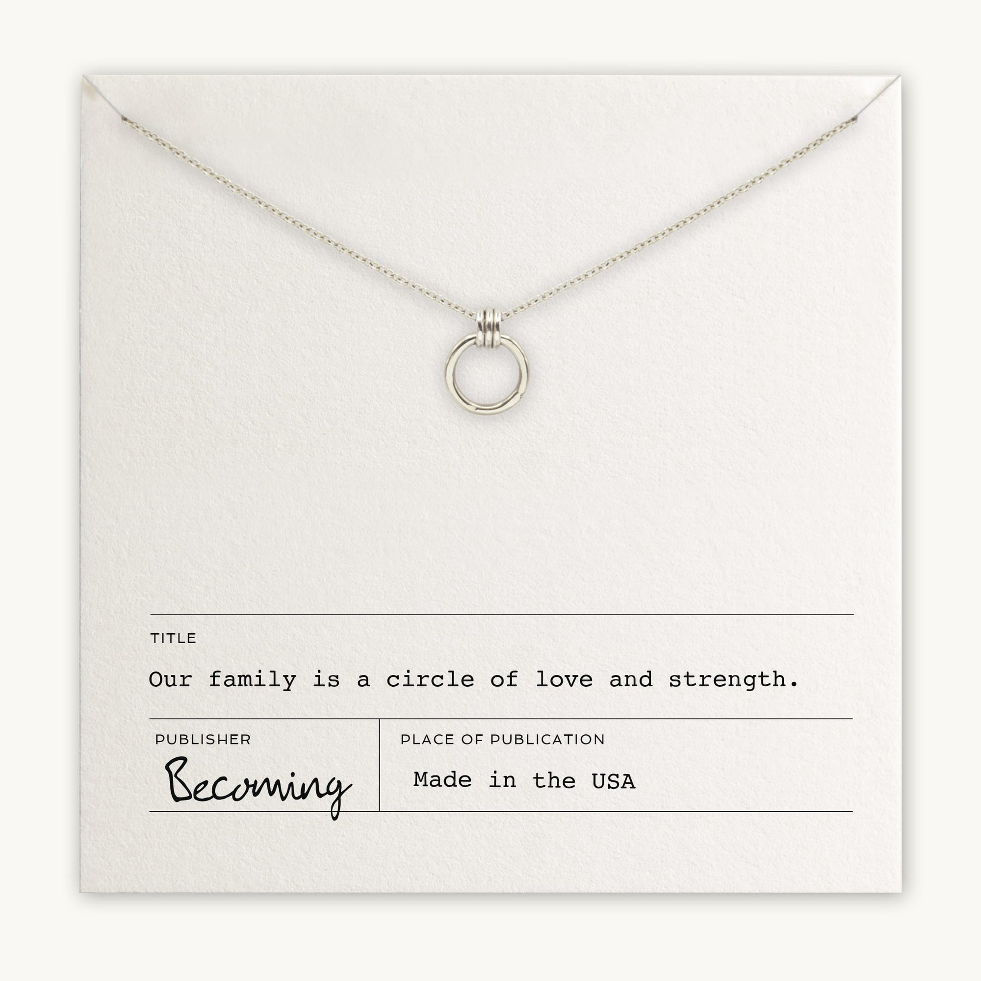 Becoming Jewelry&#39;s Family Circle Necklace on a display card with inspirational text about family love and strength, indicating the product is made in the USA.