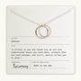 The Friendship Circles Necklace by Becoming Jewelry features two interlocking silver circles on a card with a thoughtful quote about friendship attributed to an unknown author. Made in the USA, this elegant necklace makes an ideal gift.