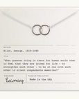 Becoming Jewelry's Joined for Life Necklace, featuring a quote by George Eliot about human connection, on a card.