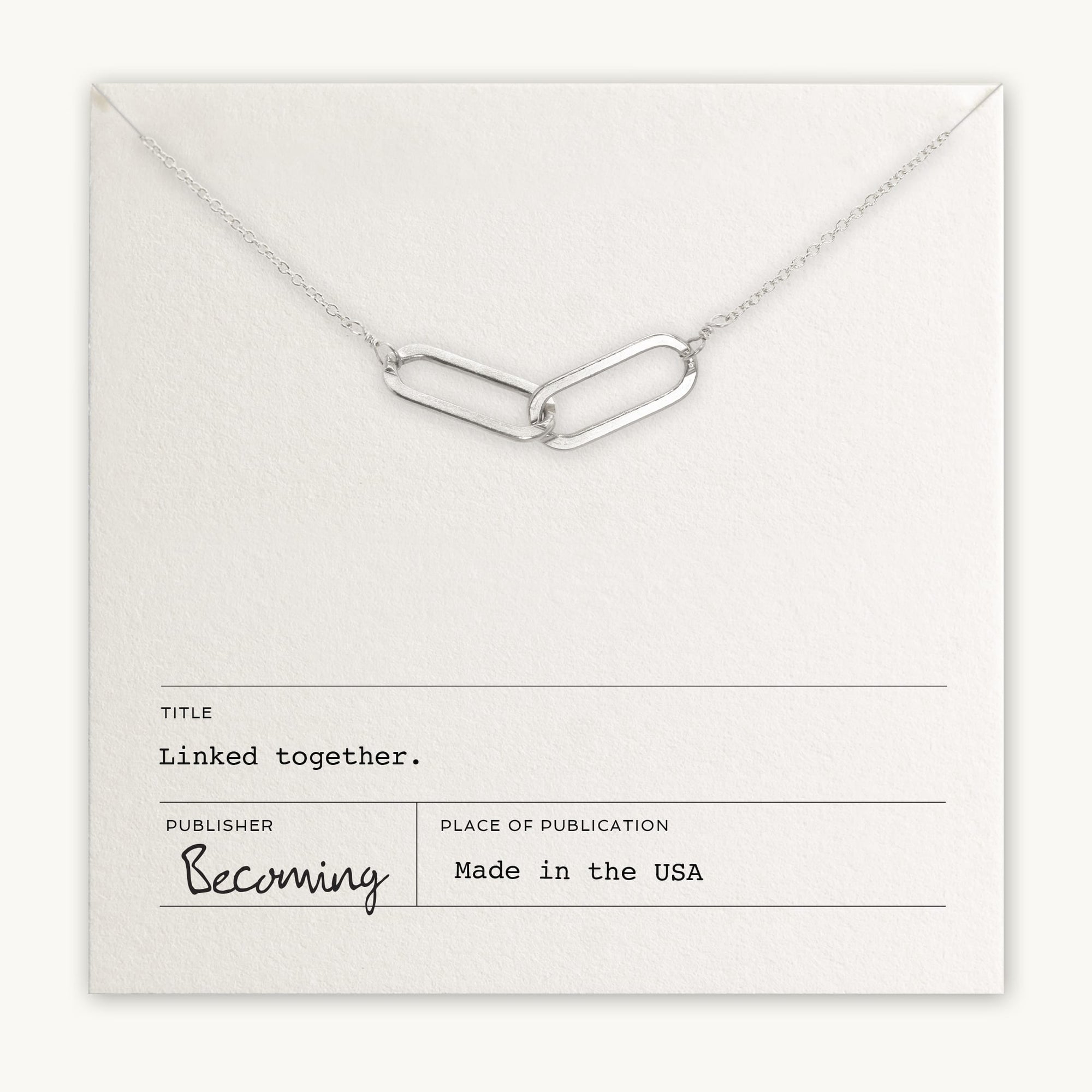 Linked Together Necklace by Becoming Jewelry with an interlinked design on a display card titled &quot;linked together,&quot; made in the USA.