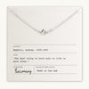 A Love Knot Necklace laid over a card with a quote by Audrey Hepburn, titled "Becoming," made in the USA by Becoming Jewelry.