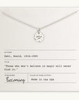 A Becoming Jewelry Believe in Magic Necklace with a shooting stars charm displayed on a card featuring a quote by Roald Dahl.