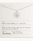 The North Star Necklace by Becoming Jewelry features a pendant with a compass charm, elegantly displayed over a card that includes an inspiring quote by Oliver Wendell Holmes Sr. The card also notes the author and the place of publication "Made in the USA." This necklace makes an exceptional gift for travelers or graduates.
