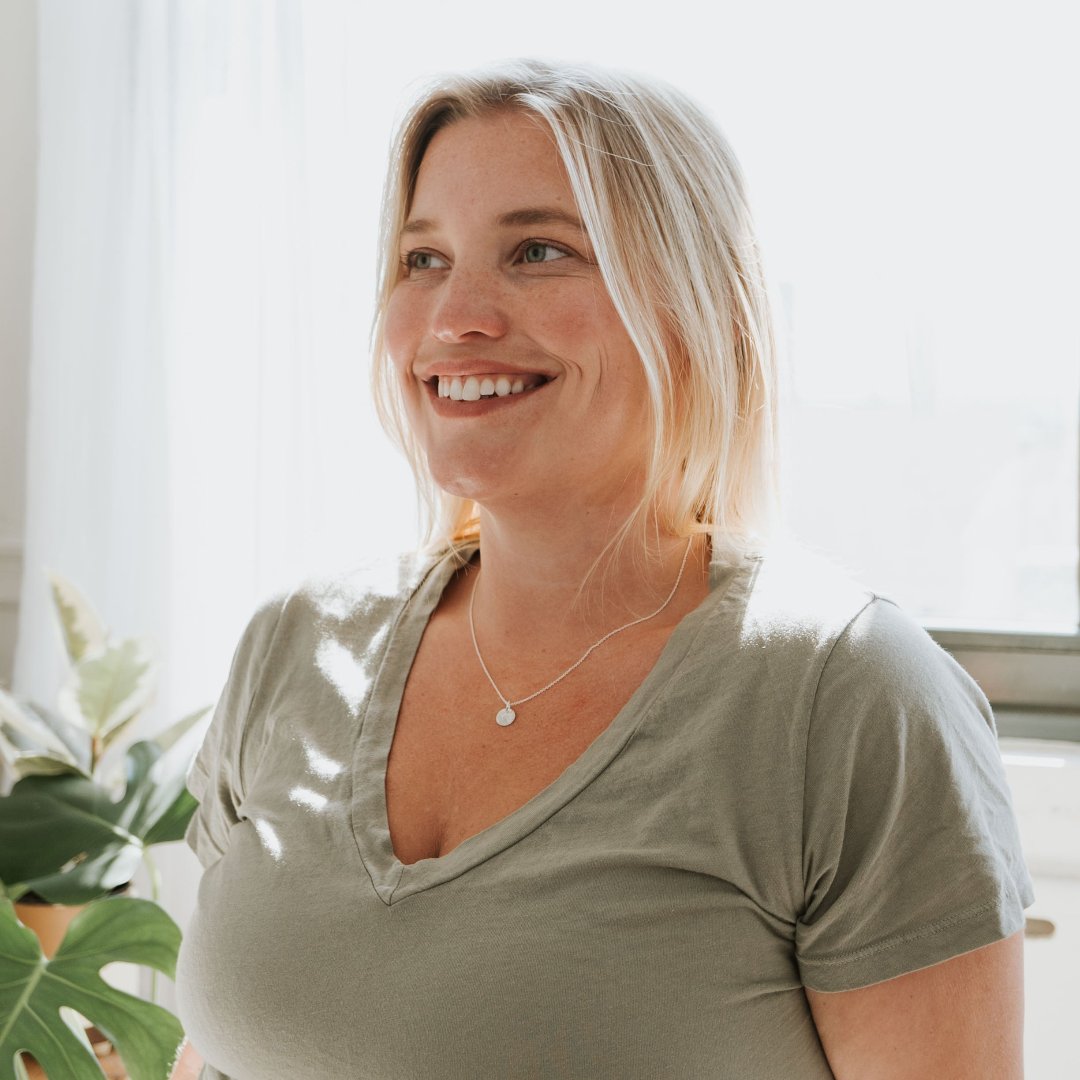 paw print necklace on model