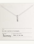 Becoming Jewelry's Pillar of Strength Necklace is a sterling silver necklace with a hammered bar drop charm on a fine cable chain, displayed on a card with the inspirational message, "you are a pillar of strength.