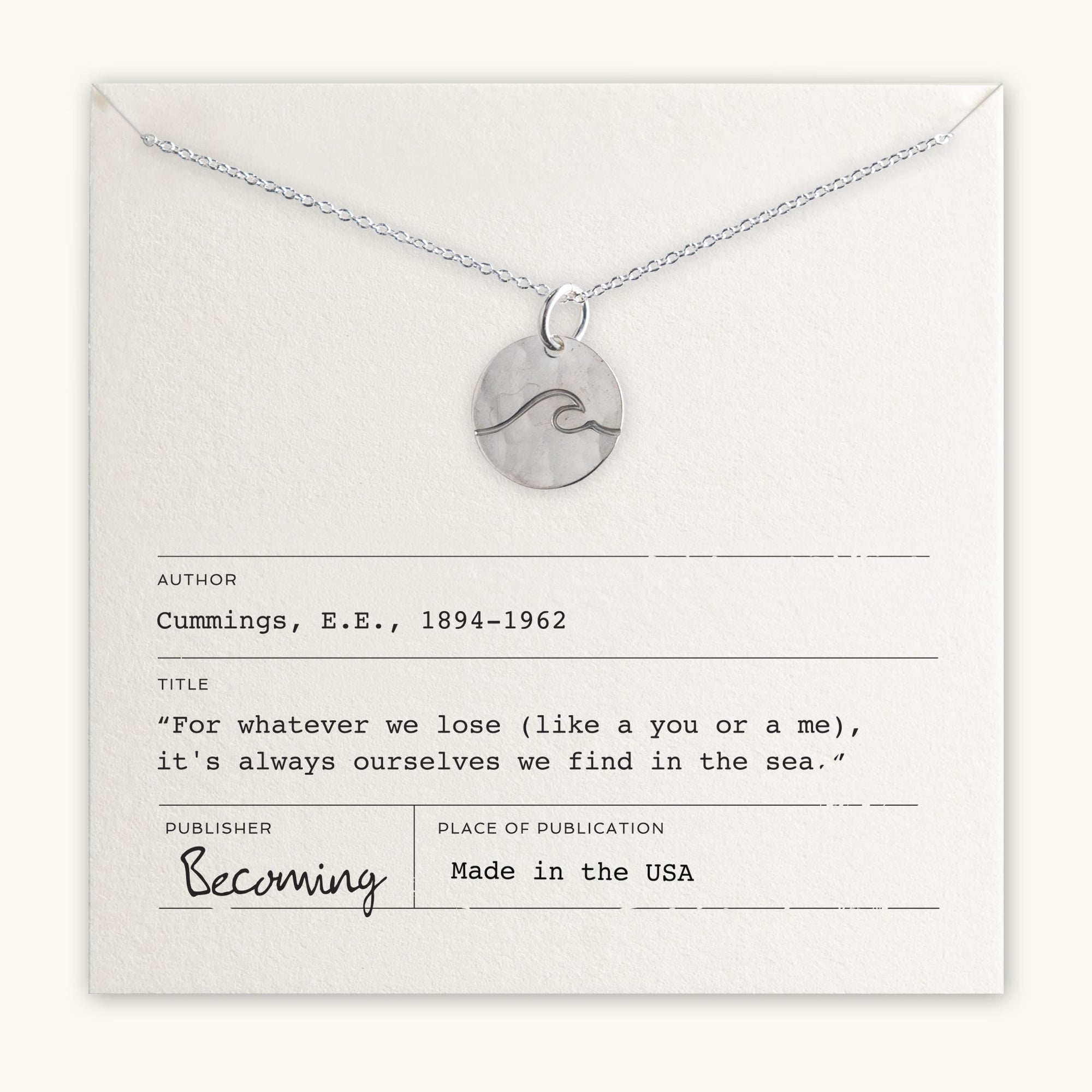 Silver Wave Round Charm Necklace by Becoming Jewelry displayed on a card featuring an inspirational quote by e.e. cummings and the word &quot;becoming&quot; at the bottom, indicating the piece&#39;s theme.