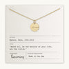A Badass Necklace by Becoming Jewelry with the word "becoming" engraved, displayed on a card featuring a quote by Nora Ephron, "Above all, be the heroine of your life, not the victim".