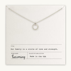 Becoming Jewelry's Family Circle Necklace on a display card with inspirational text about family love and strength, indicating the product is made in the USA.