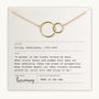 Becoming Jewelry's Mother Necklace, featuring gold interlinked rings, is elegantly displayed on a card with a touching quote about mothers by Washington Irving (1783-1859). Made in the USA, this piece beautifully symbolizes a mother's love and that special relationship.
